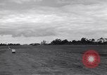 Image of P-51s of 354th Fighter Group landing Criqueville France, 1944, second 52 stock footage video 65675033408