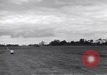 Image of P-51s of 354th Fighter Group landing Criqueville France, 1944, second 53 stock footage video 65675033408