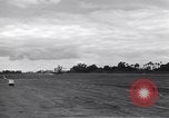 Image of P-51s of 354th Fighter Group landing Criqueville France, 1944, second 54 stock footage video 65675033408