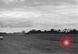 Image of P-51s of 354th Fighter Group landing Criqueville France, 1944, second 55 stock footage video 65675033408