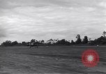 Image of P-51s of 354th Fighter Group landing Criqueville France, 1944, second 58 stock footage video 65675033408
