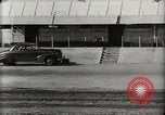 Image of Wrecked Planes Hangars and Ships Pearl Harbor Hawaii USA, 1942, second 7 stock footage video 65675033414