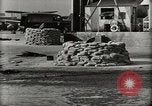 Image of Wrecked Planes Hangars and Ships Pearl Harbor Hawaii USA, 1942, second 10 stock footage video 65675033414