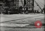 Image of Wrecked Planes Hangars and Ships Pearl Harbor Hawaii USA, 1942, second 18 stock footage video 65675033414