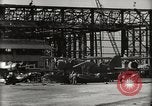 Image of Wrecked Planes Hangars and Ships Pearl Harbor Hawaii USA, 1942, second 21 stock footage video 65675033414