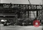 Image of Wrecked Planes Hangars and Ships Pearl Harbor Hawaii USA, 1942, second 22 stock footage video 65675033414