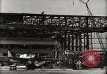 Image of Wrecked Planes Hangars and Ships Pearl Harbor Hawaii USA, 1942, second 25 stock footage video 65675033414