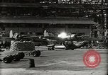 Image of Wrecked Planes Hangars and Ships Pearl Harbor Hawaii USA, 1942, second 29 stock footage video 65675033414