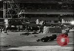 Image of Wrecked Planes Hangars and Ships Pearl Harbor Hawaii USA, 1942, second 34 stock footage video 65675033414