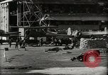 Image of Wrecked Planes Hangars and Ships Pearl Harbor Hawaii USA, 1942, second 35 stock footage video 65675033414