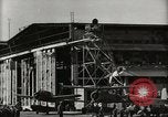 Image of Wrecked Planes Hangars and Ships Pearl Harbor Hawaii USA, 1942, second 43 stock footage video 65675033414