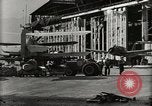 Image of Wrecked Planes Hangars and Ships Pearl Harbor Hawaii USA, 1942, second 49 stock footage video 65675033414