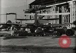 Image of Wrecked Planes Hangars and Ships Pearl Harbor Hawaii USA, 1942, second 54 stock footage video 65675033414