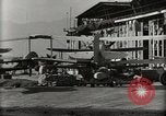 Image of Wrecked Planes Hangars and Ships Pearl Harbor Hawaii USA, 1942, second 55 stock footage video 65675033414