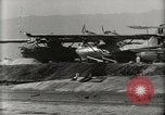 Image of Wrecked Planes Hangars and Ships Pearl Harbor Hawaii USA, 1942, second 62 stock footage video 65675033414
