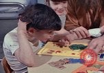 Image of modifying behavior of mentally disabled Kansas United States USA, 1975, second 42 stock footage video 65675033443