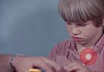 Image of modifying behavior of mentally disabled Kansas United States USA, 1975, second 51 stock footage video 65675033443