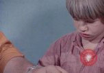 Image of modifying behavior of mentally disabled Kansas United States USA, 1975, second 52 stock footage video 65675033443
