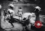 Image of American and Australian forces battle Japanese in New Guinea New Guinea, 1943, second 30 stock footage video 65675033548