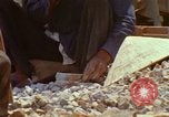 Image of Vietnamese men An Thoi Phu Quoc Vietnam, 1966, second 9 stock footage video 65675033634