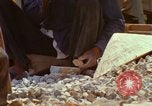 Image of Vietnamese men An Thoi Phu Quoc Vietnam, 1966, second 10 stock footage video 65675033634