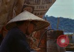 Image of Vietnamese men An Thoi Phu Quoc Vietnam, 1966, second 15 stock footage video 65675033634