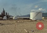 Image of fuel station Nha Trang Vietnam, 1966, second 5 stock footage video 65675033640