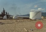 Image of fuel station Nha Trang Vietnam, 1966, second 7 stock footage video 65675033640