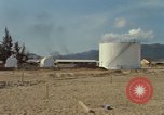 Image of fuel station Nha Trang Vietnam, 1966, second 9 stock footage video 65675033640