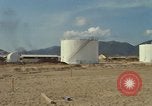 Image of fuel station Nha Trang Vietnam, 1966, second 12 stock footage video 65675033640