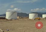 Image of fuel station Nha Trang Vietnam, 1966, second 15 stock footage video 65675033640