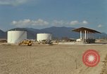 Image of fuel station Nha Trang Vietnam, 1966, second 17 stock footage video 65675033640