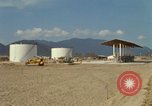 Image of fuel station Nha Trang Vietnam, 1966, second 21 stock footage video 65675033640