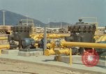 Image of fuel station Nha Trang Vietnam, 1966, second 58 stock footage video 65675033640