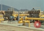Image of fuel station Nha Trang Vietnam, 1966, second 59 stock footage video 65675033640