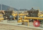 Image of fuel station Nha Trang Vietnam, 1966, second 60 stock footage video 65675033640