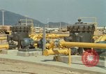 Image of fuel station Nha Trang Vietnam, 1966, second 61 stock footage video 65675033640