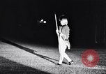 Image of Nighttime parade and drill team exhibition by the Old Guard Washington DC USA, 1966, second 50 stock footage video 65675033734