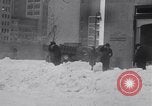 Image of unseasonal blizzard New York City USA, 1938, second 18 stock footage video 65675033797