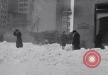 Image of unseasonal blizzard New York City USA, 1938, second 19 stock footage video 65675033797