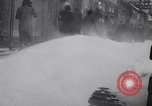Image of unseasonal blizzard New York City USA, 1938, second 23 stock footage video 65675033797