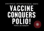 Image of Jonas Salk Polio vaccine deployed Ann Arbor Michigan USA, 1955, second 4 stock footage video 65675033801
