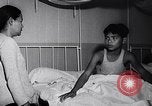 Image of Heavily damaged building Saigon Vietnam, 1955, second 26 stock footage video 65675033817
