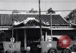 Image of Heavily damaged building Saigon Vietnam, 1955, second 30 stock footage video 65675033817