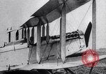 Image of Liberty L-12 airplane engine and fliers of the 94th Aero Squadron United States USA, 1918, second 50 stock footage video 65675033856
