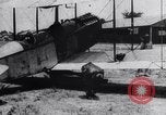 Image of Liberty L-12 airplane engine and fliers of the 94th Aero Squadron United States USA, 1918, second 52 stock footage video 65675033856