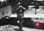 Image of Liberty L-12 airplane engine and fliers of the 94th Aero Squadron United States USA, 1918, second 53 stock footage video 65675033856