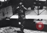 Image of Liberty L-12 airplane engine and fliers of the 94th Aero Squadron United States USA, 1918, second 55 stock footage video 65675033856