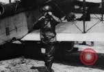 Image of Liberty L-12 airplane engine and fliers of the 94th Aero Squadron United States USA, 1918, second 56 stock footage video 65675033856