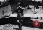 Image of Liberty L-12 airplane engine and fliers of the 94th Aero Squadron United States USA, 1918, second 57 stock footage video 65675033856